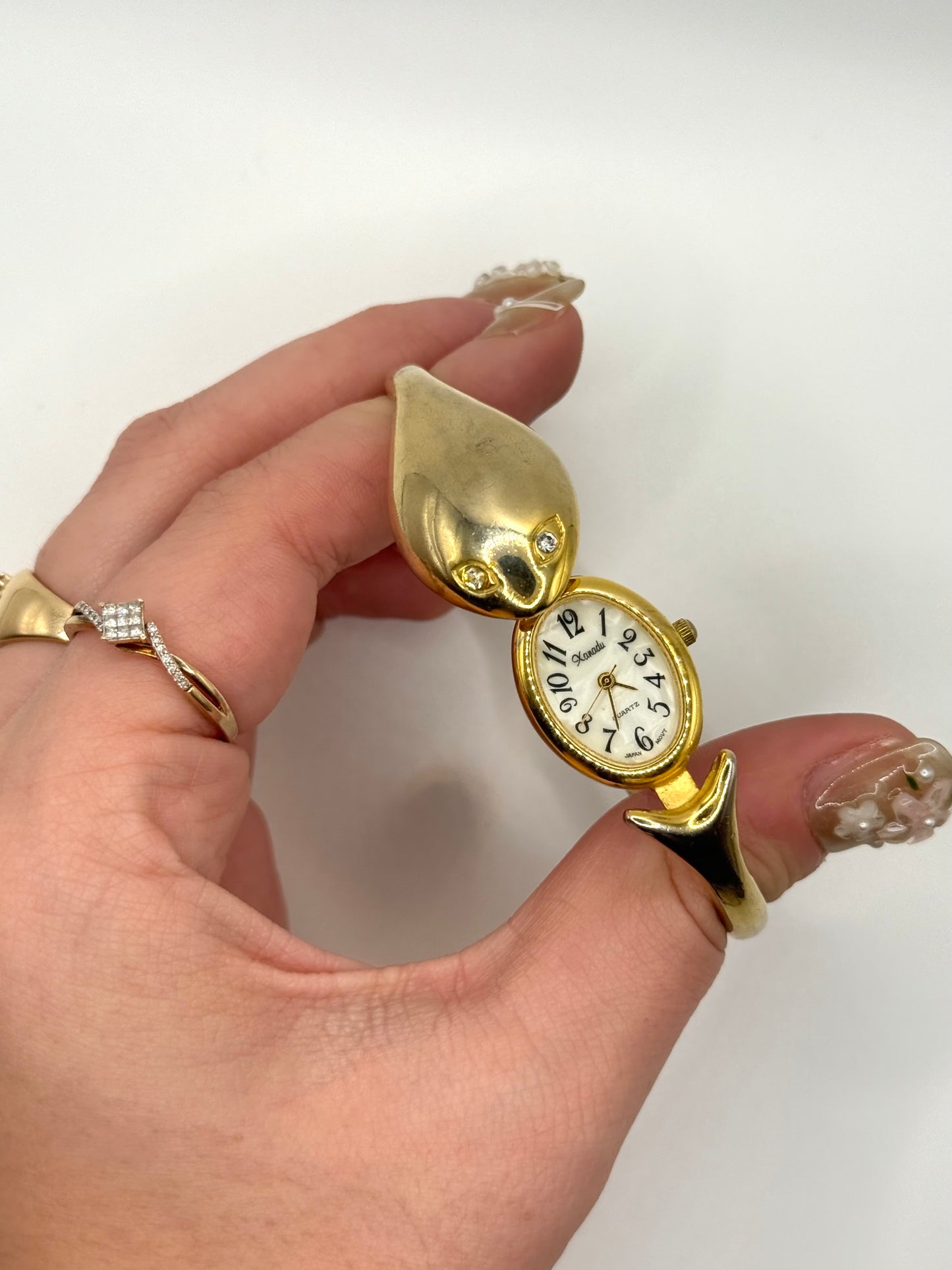 working gold tone snake peek a boo watch