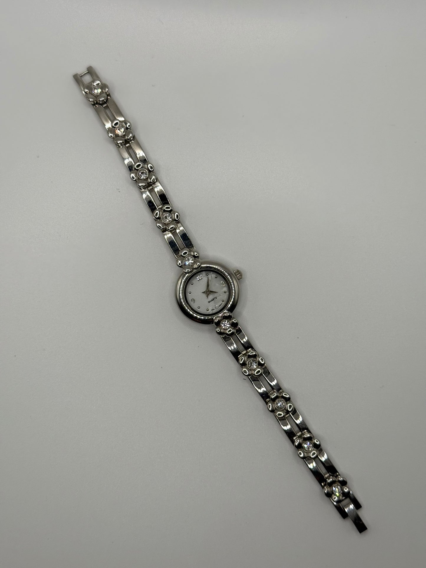 working silver tone floral decal watch