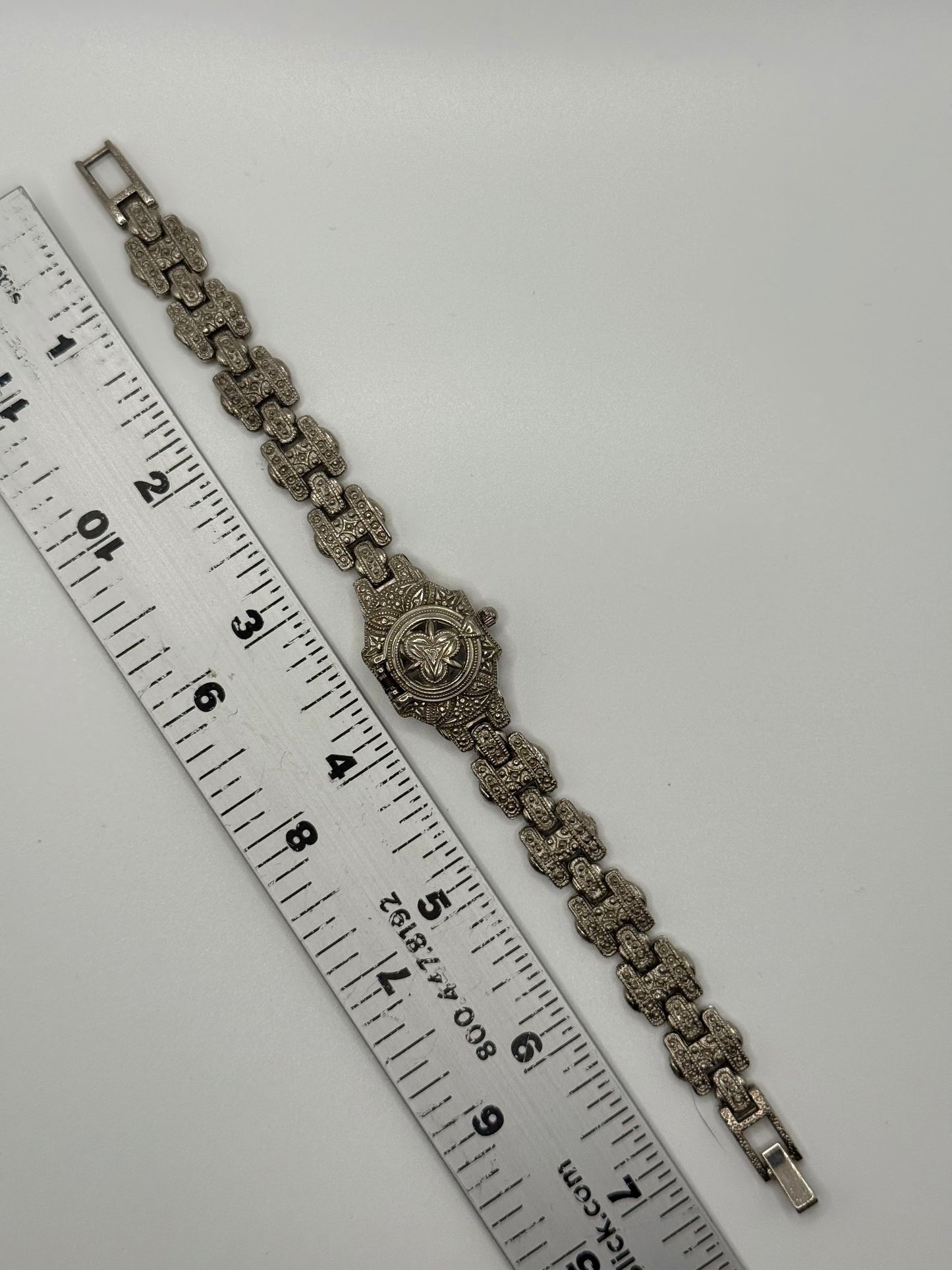 nonworking silver tone peek a boo watch