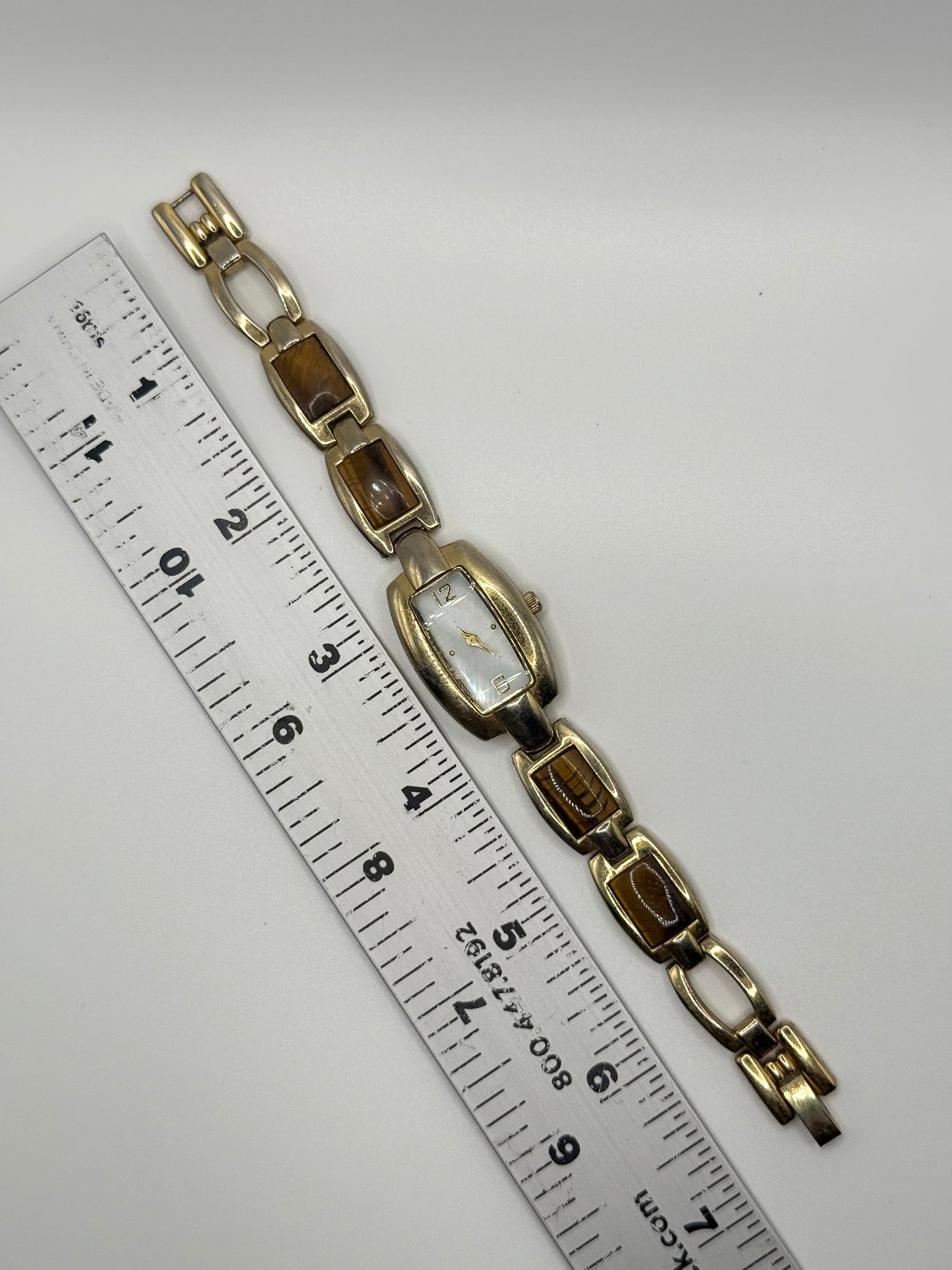 working gold tone tigers eye watch