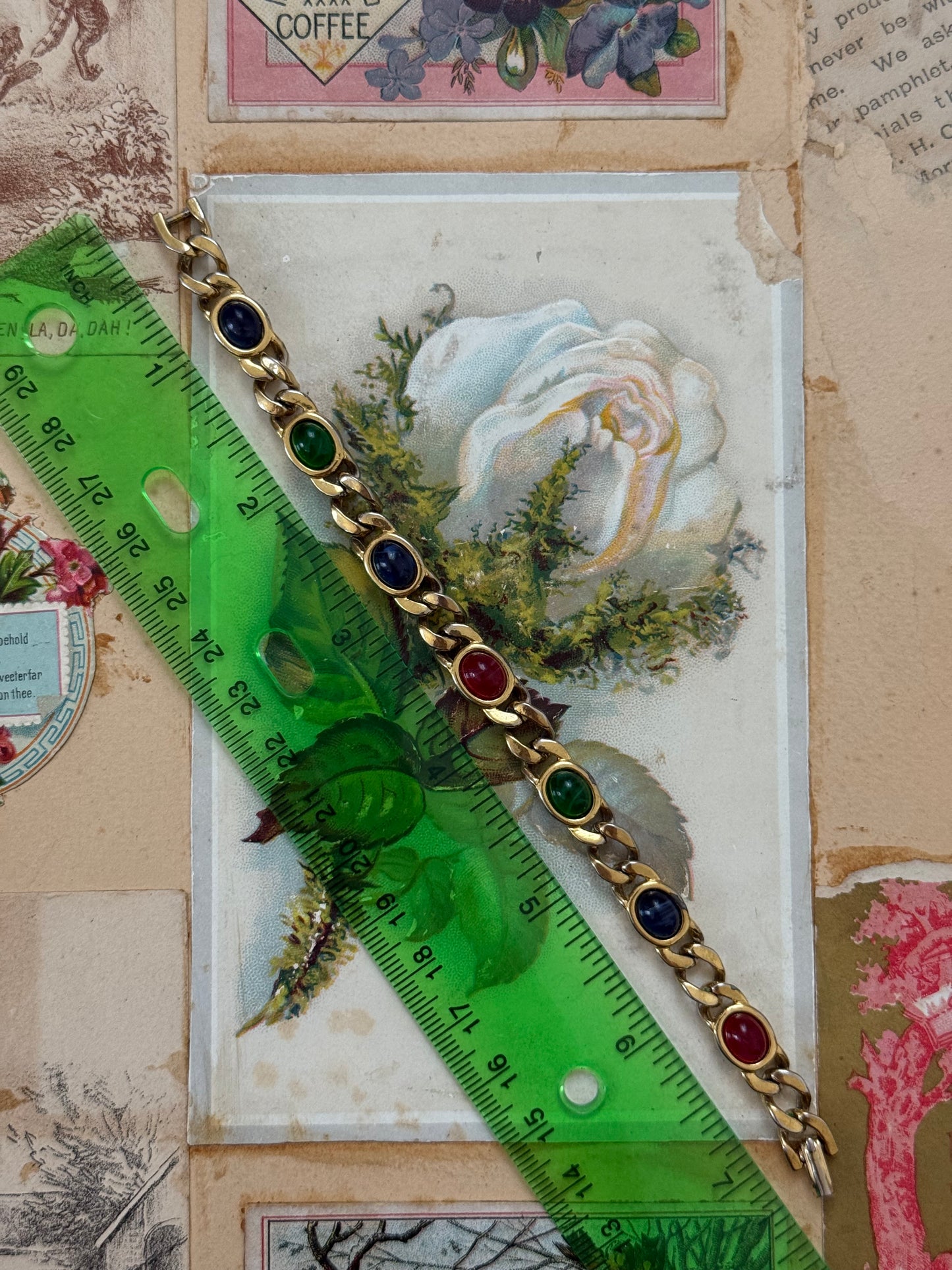 gold tone multicolored gemstone bracelet