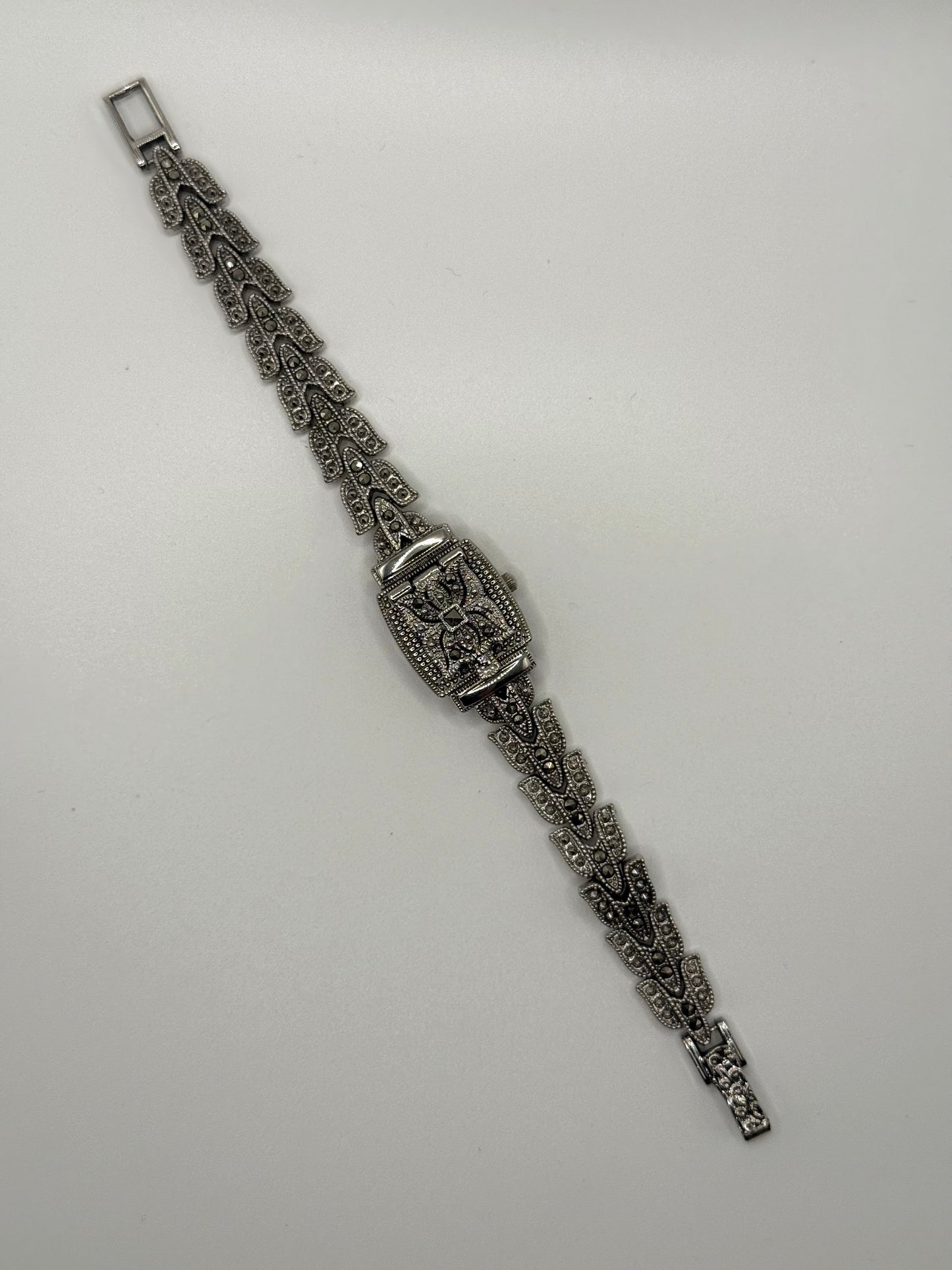 working silver tone marcasite peek a boo watch