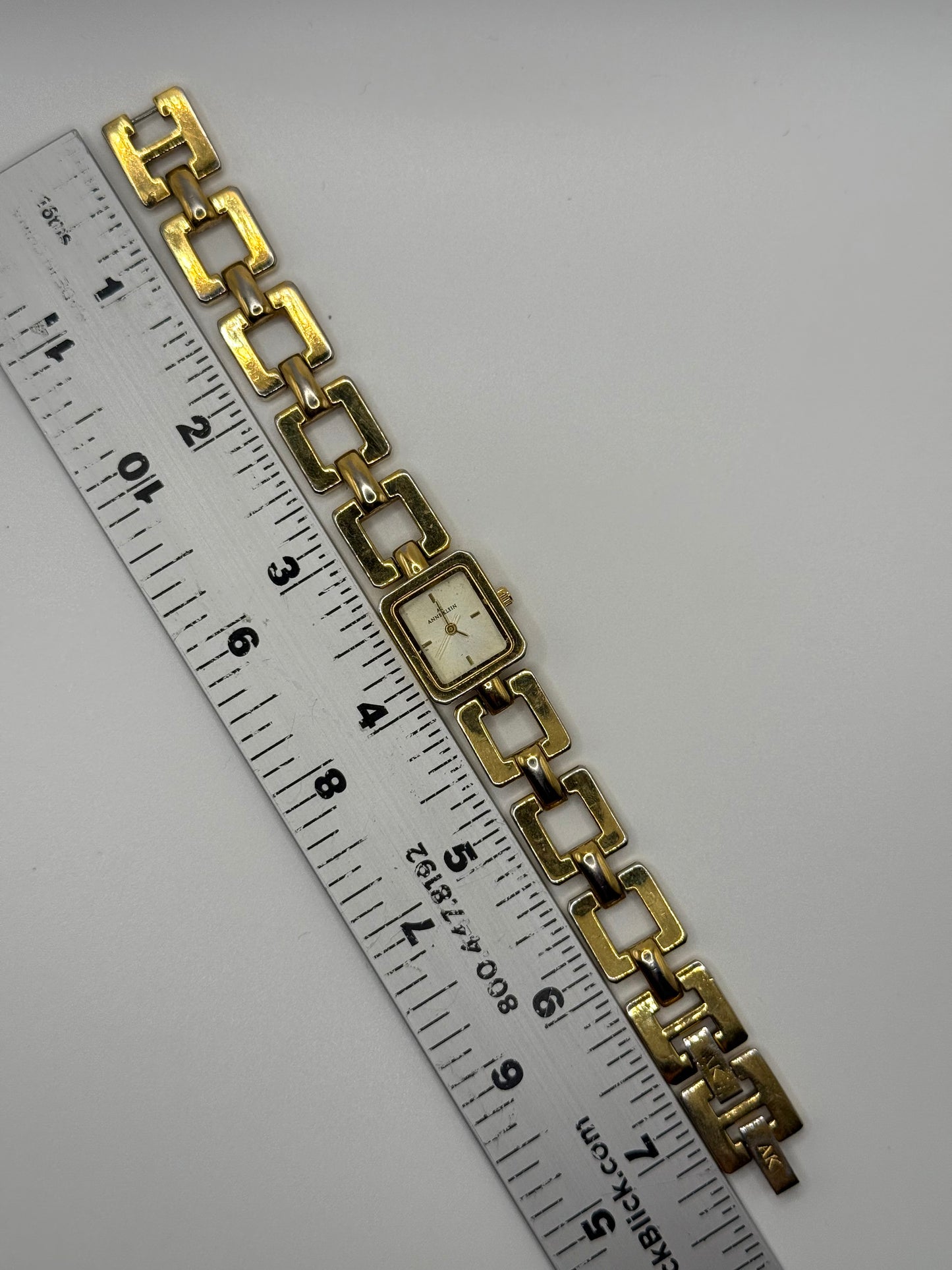 working gold tone watch