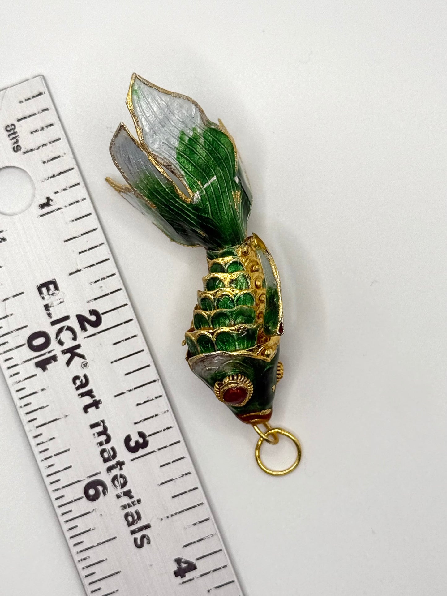 gold tone enameled articulated fish pendant