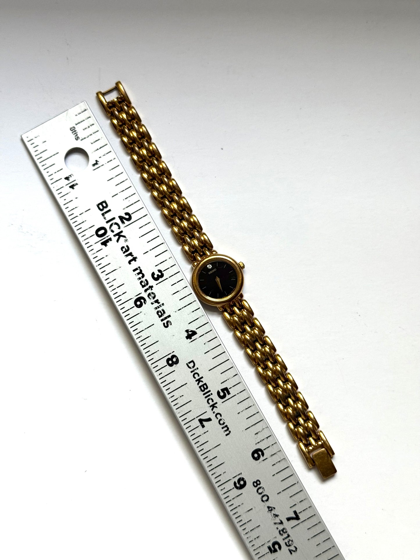 working gold tone black dial seiko watch