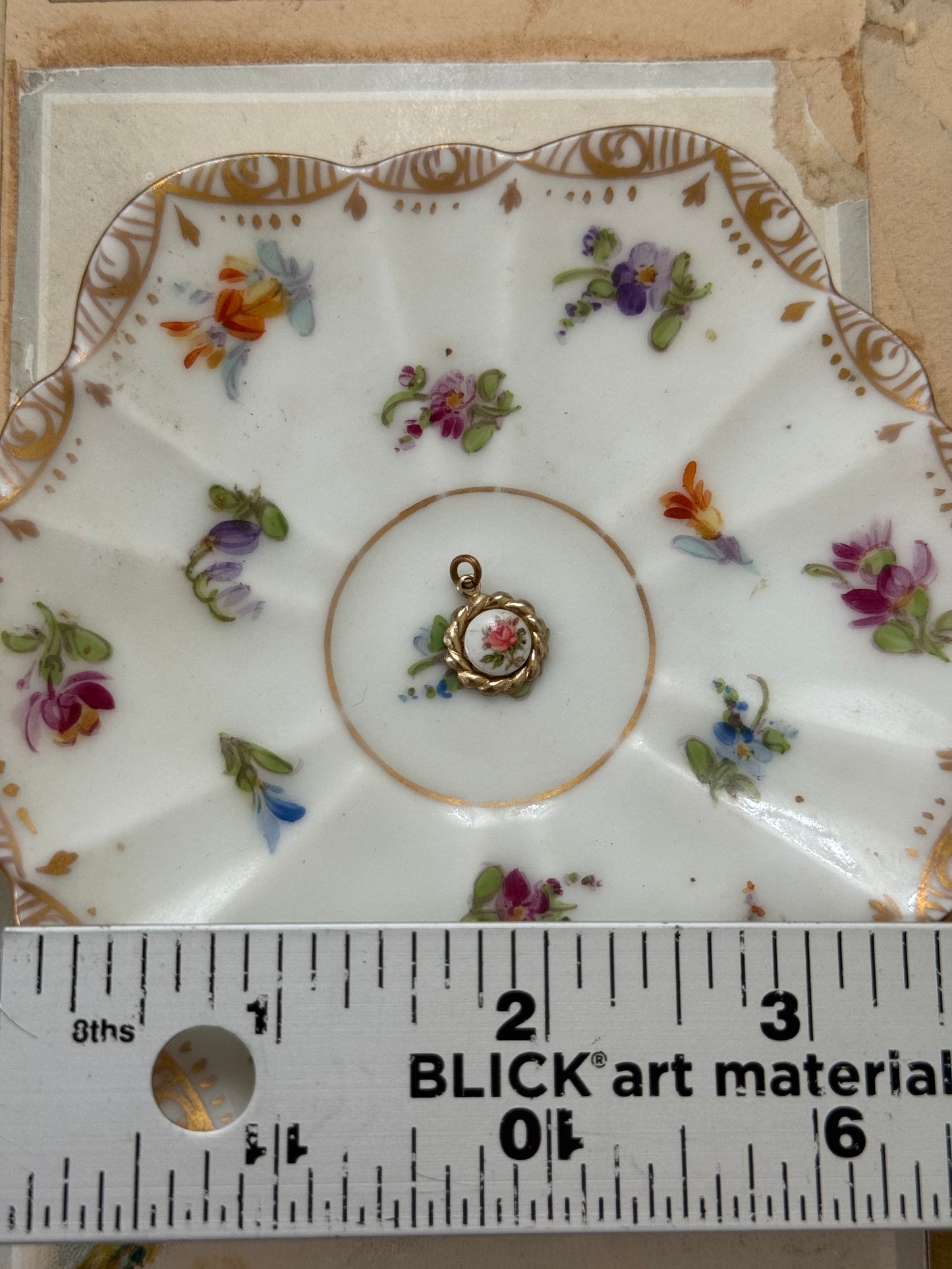 gold tone micro floral pendant