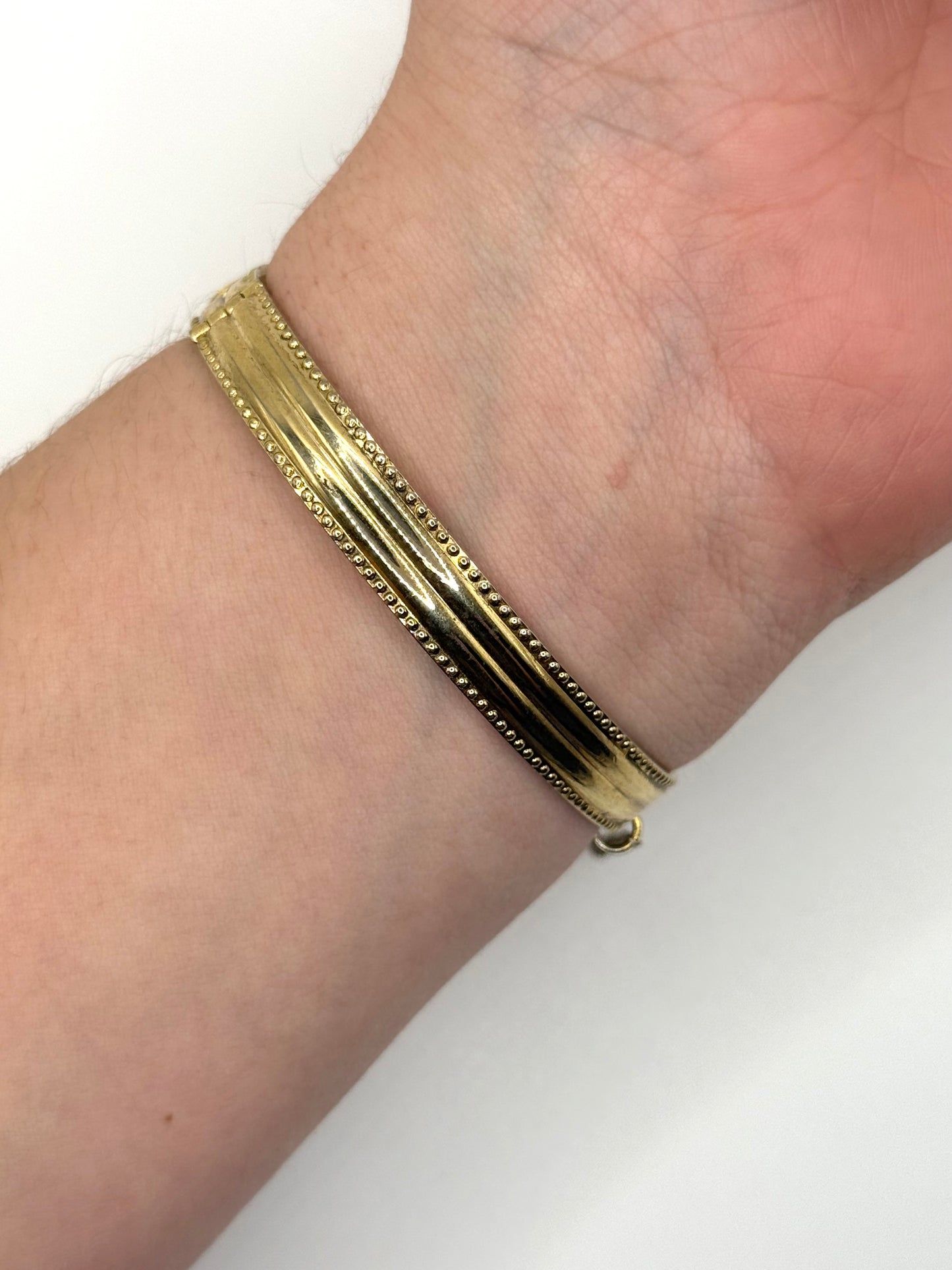 gold tone floral cuff bracelet