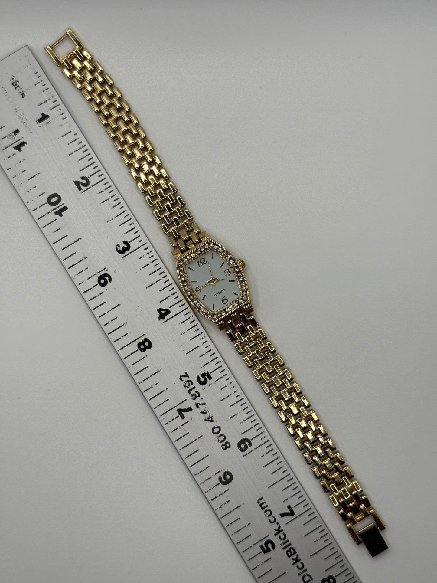 working gold tone watch