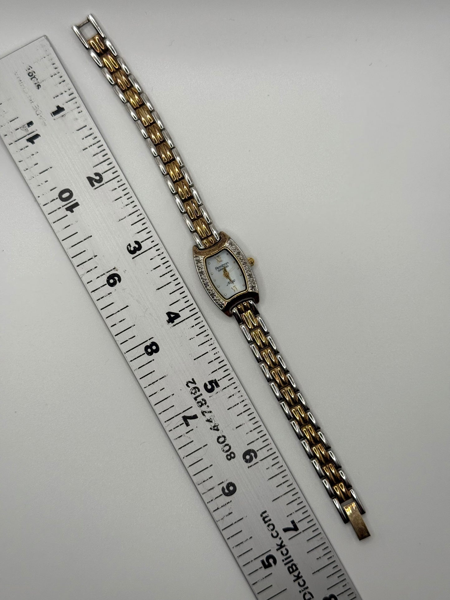 working two tone diamond bezel watch