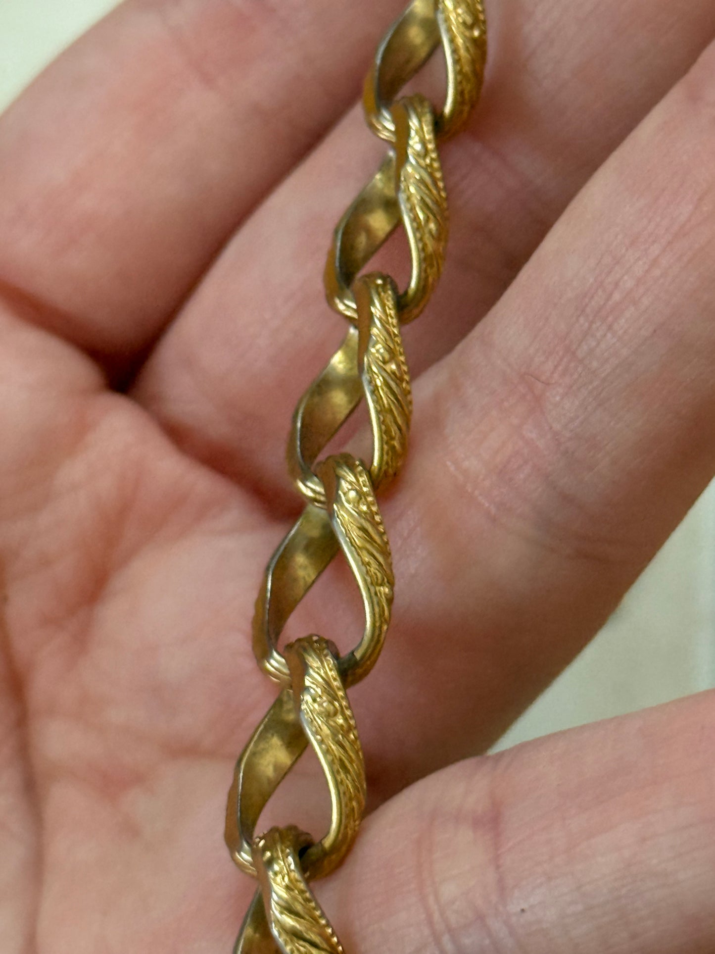 gold tone chain link detailed bracelet