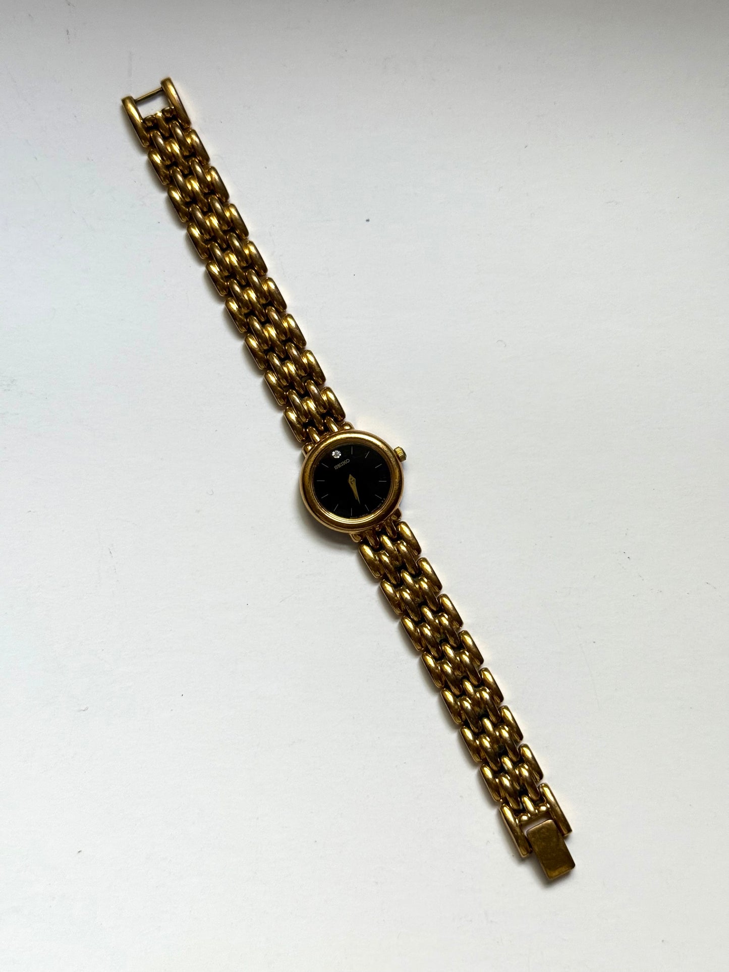 working gold tone black dial seiko watch