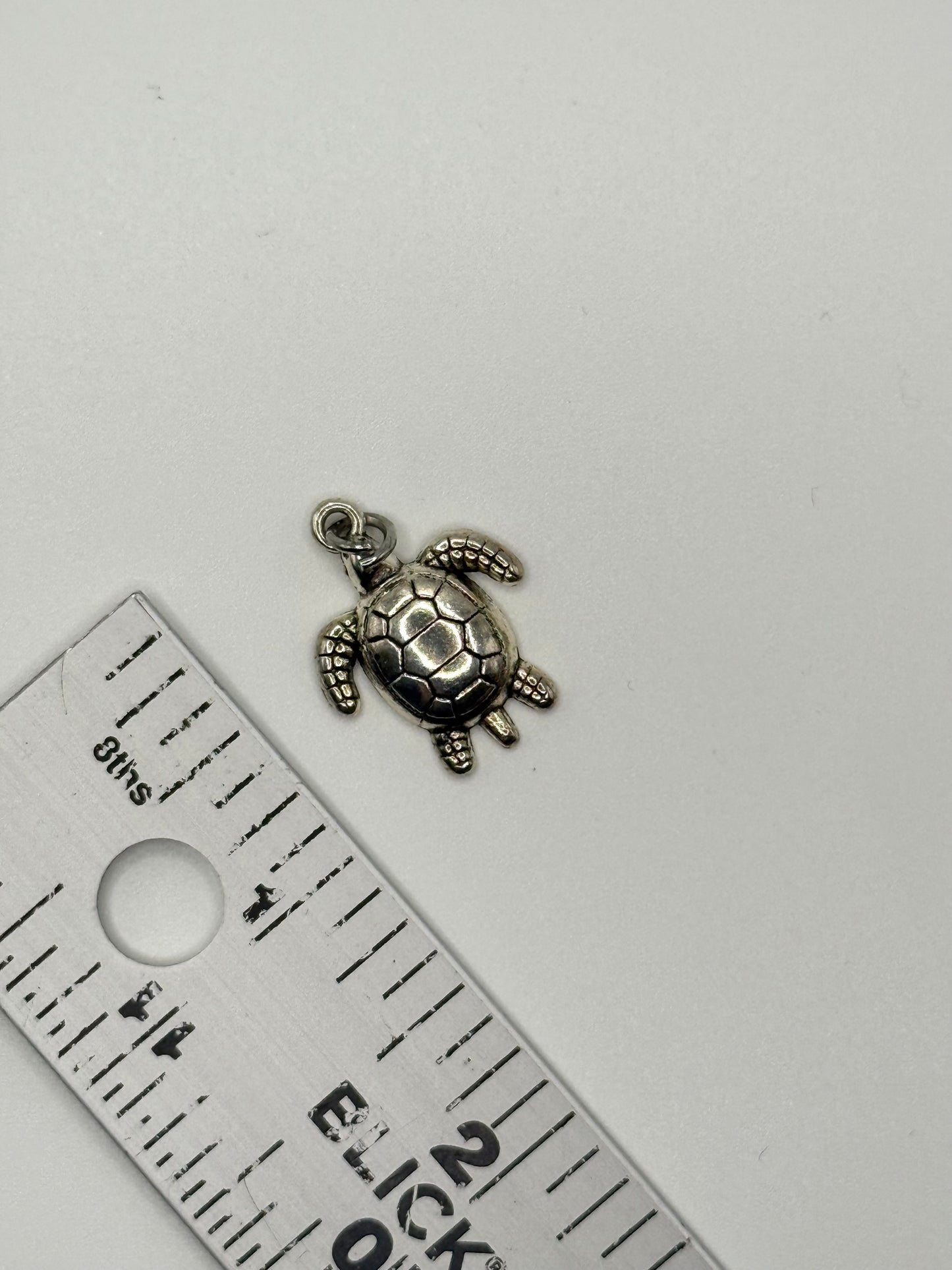 silver tone turtle pendant