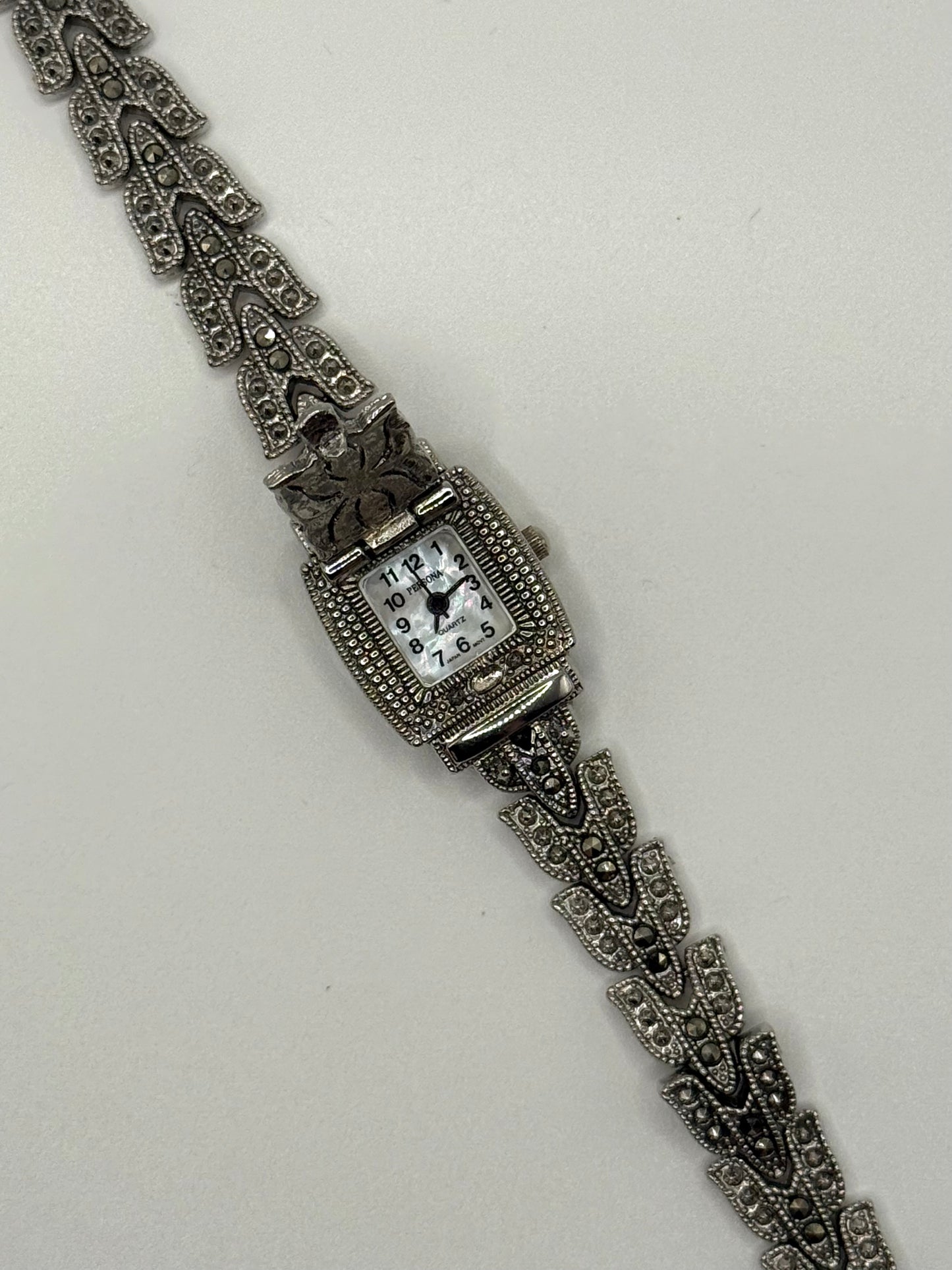 working silver tone marcasite peek a boo watch