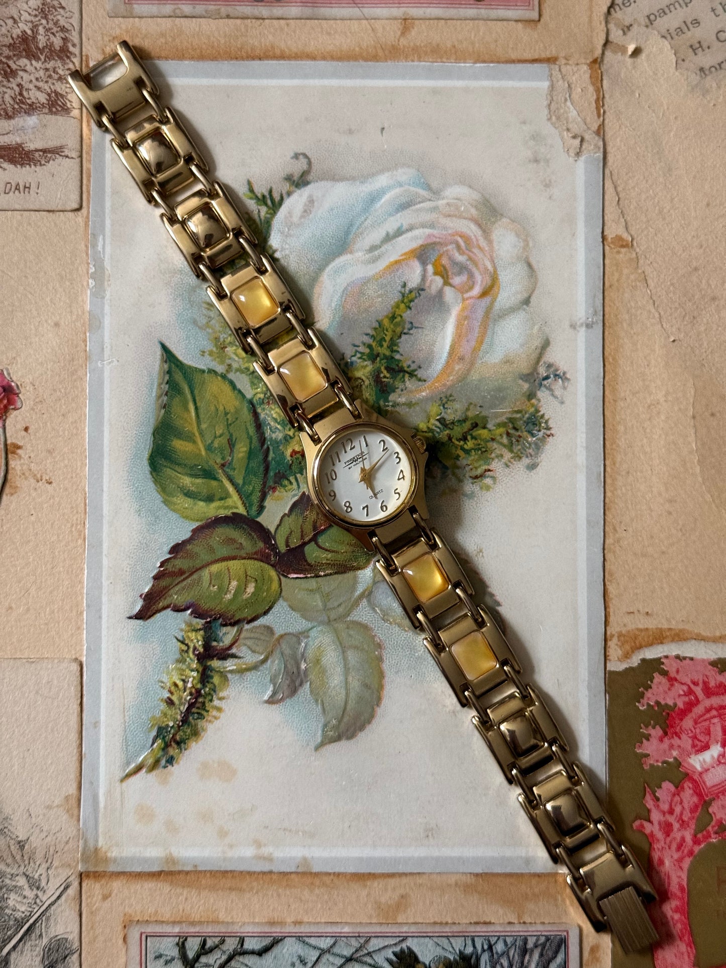 working gold tone gemstone watch