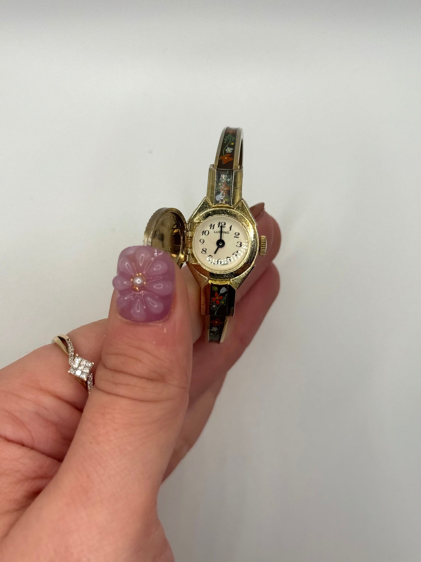 nonworking gold tone peek a boo watch