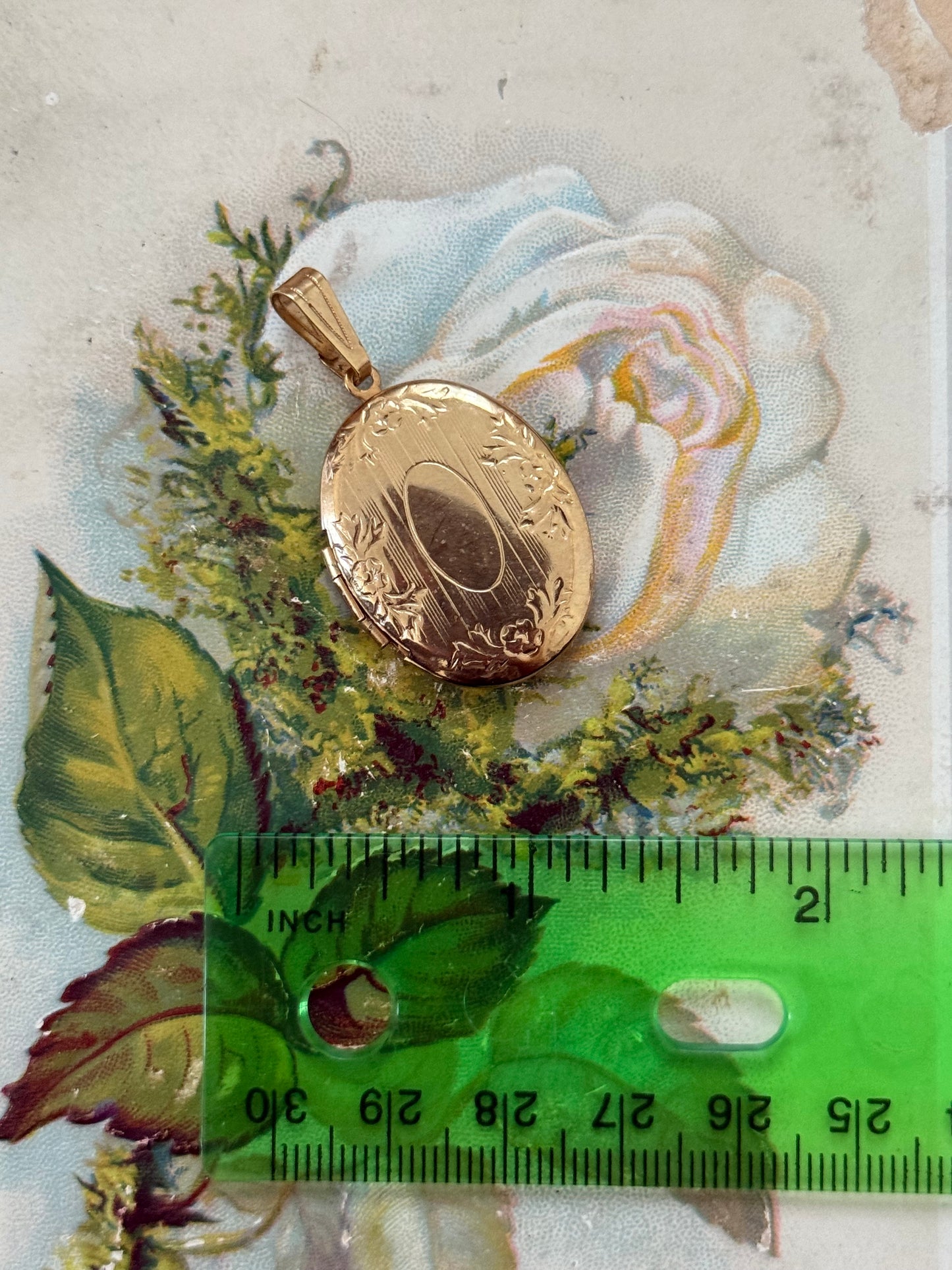 gold tone locket pendant