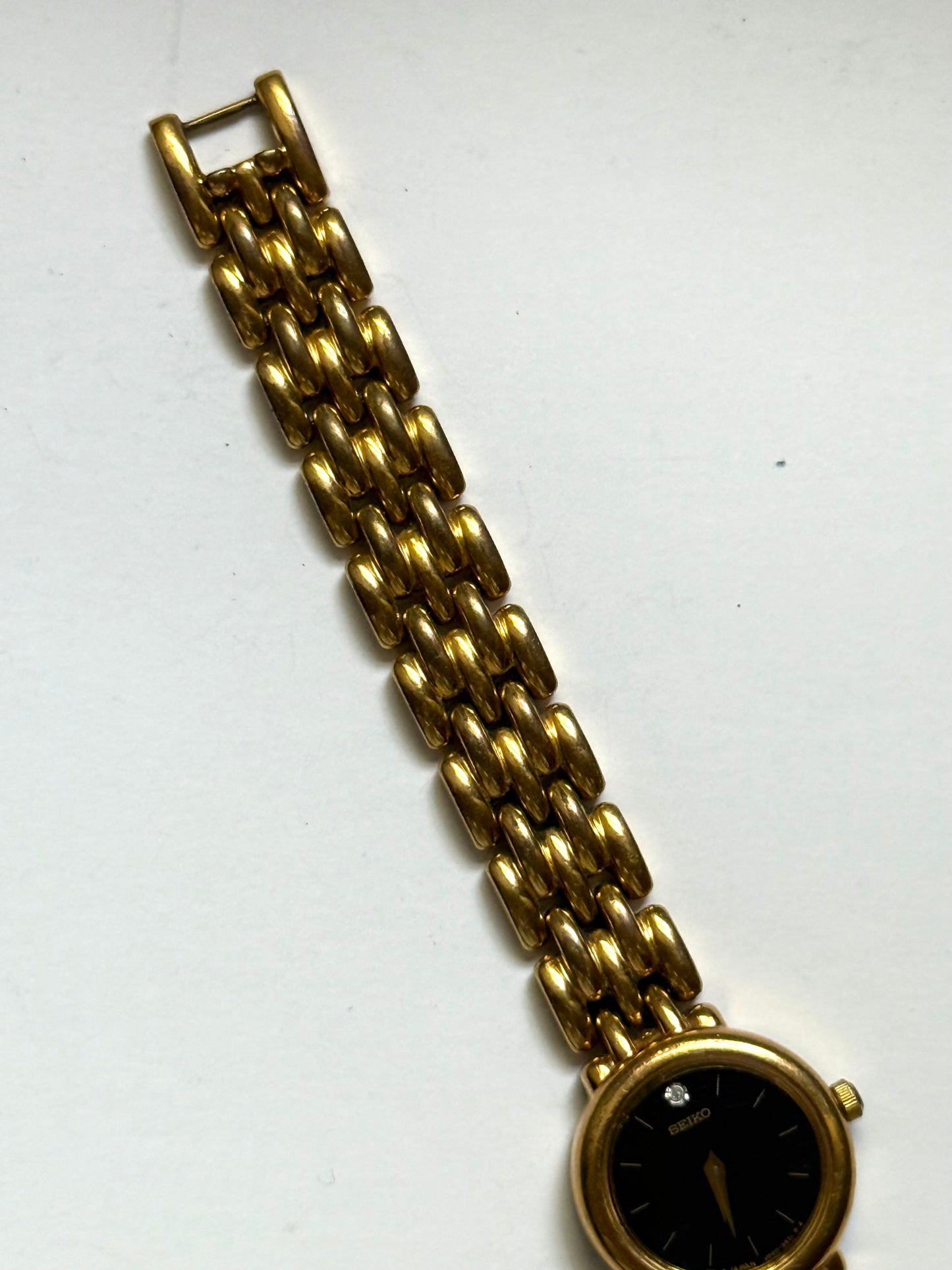 working gold tone black dial seiko watch