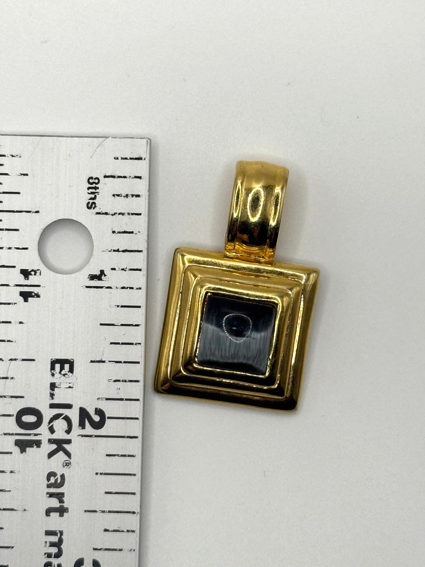 gold tone cat’s eye egyptian style pendant