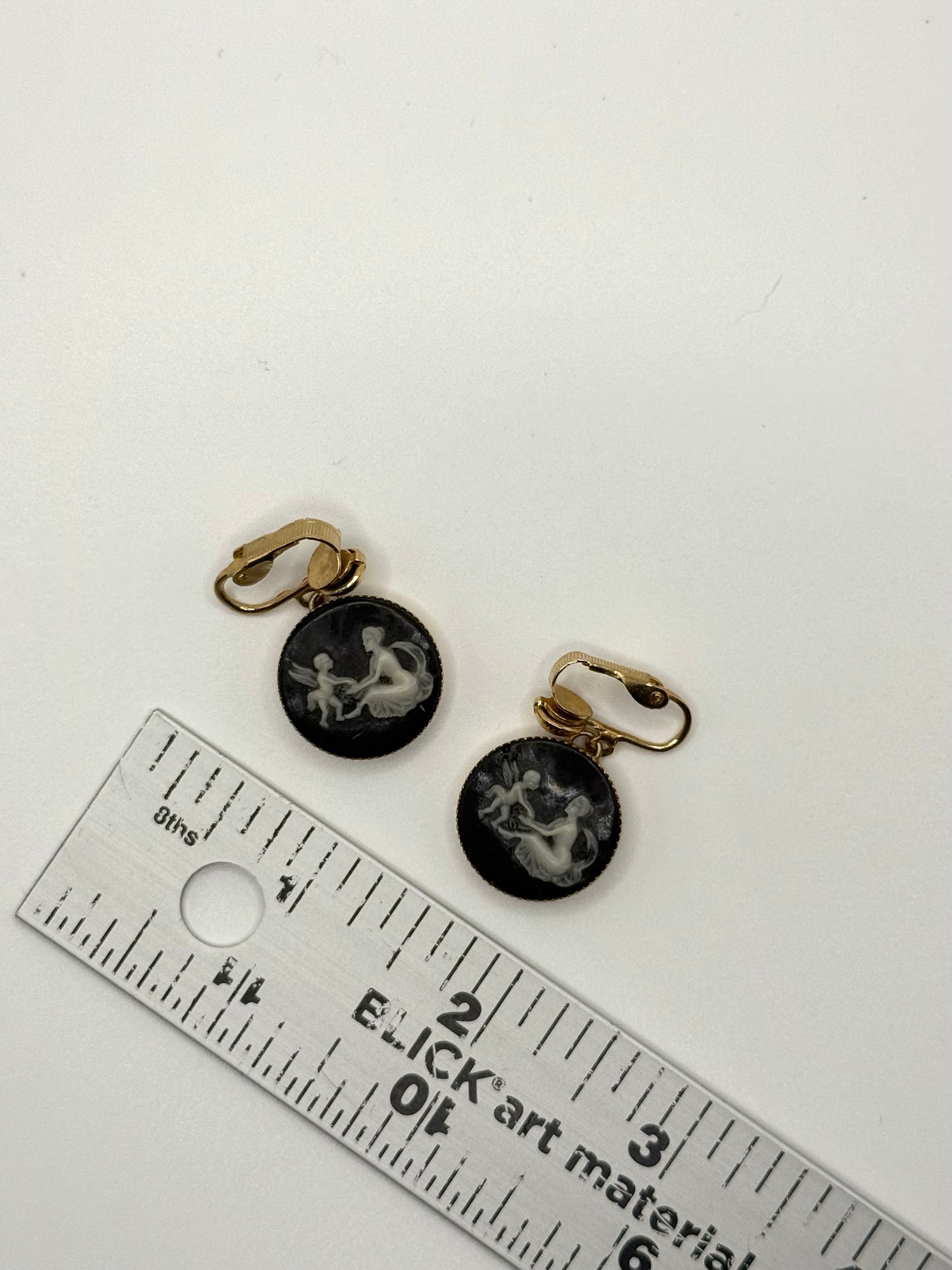 gold tone cameo clip on earrings