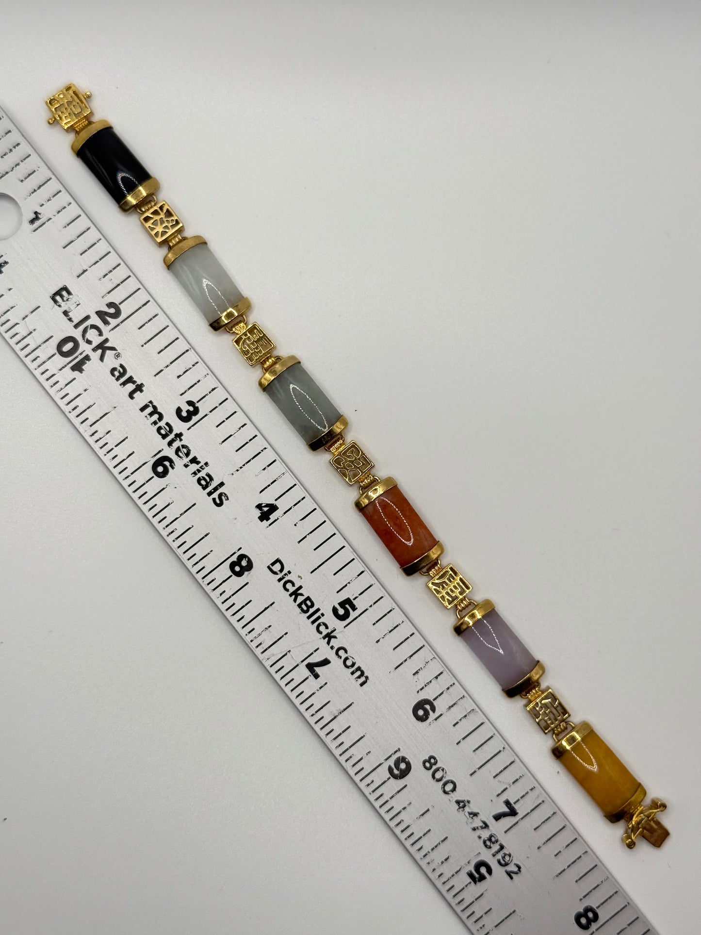 gold tone colored jade bracelet