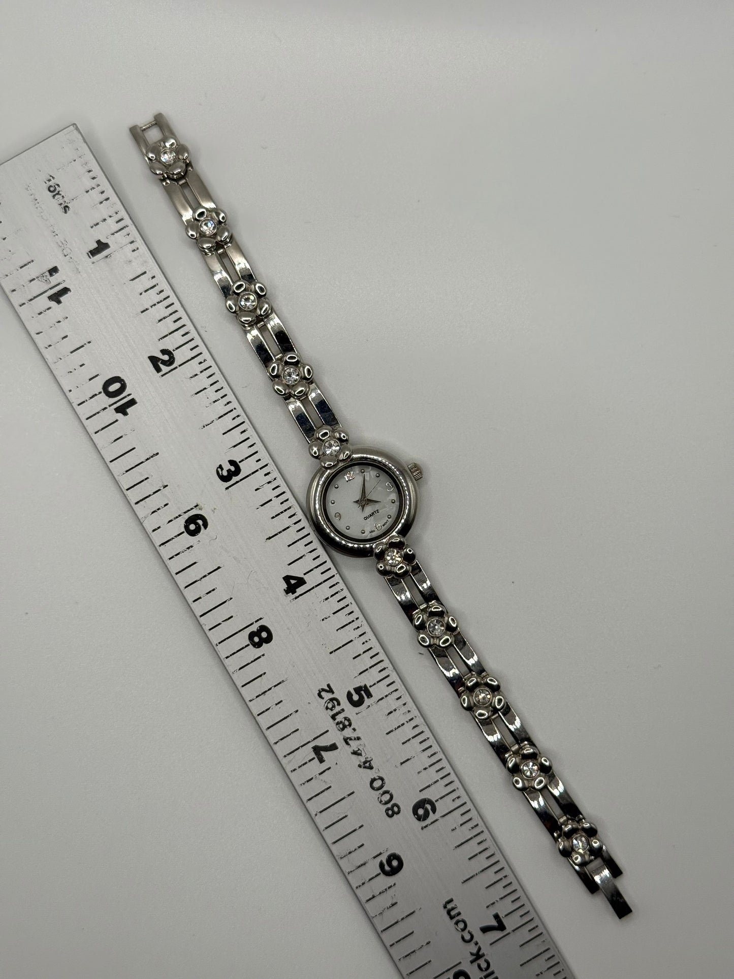 working silver tone floral decal watch