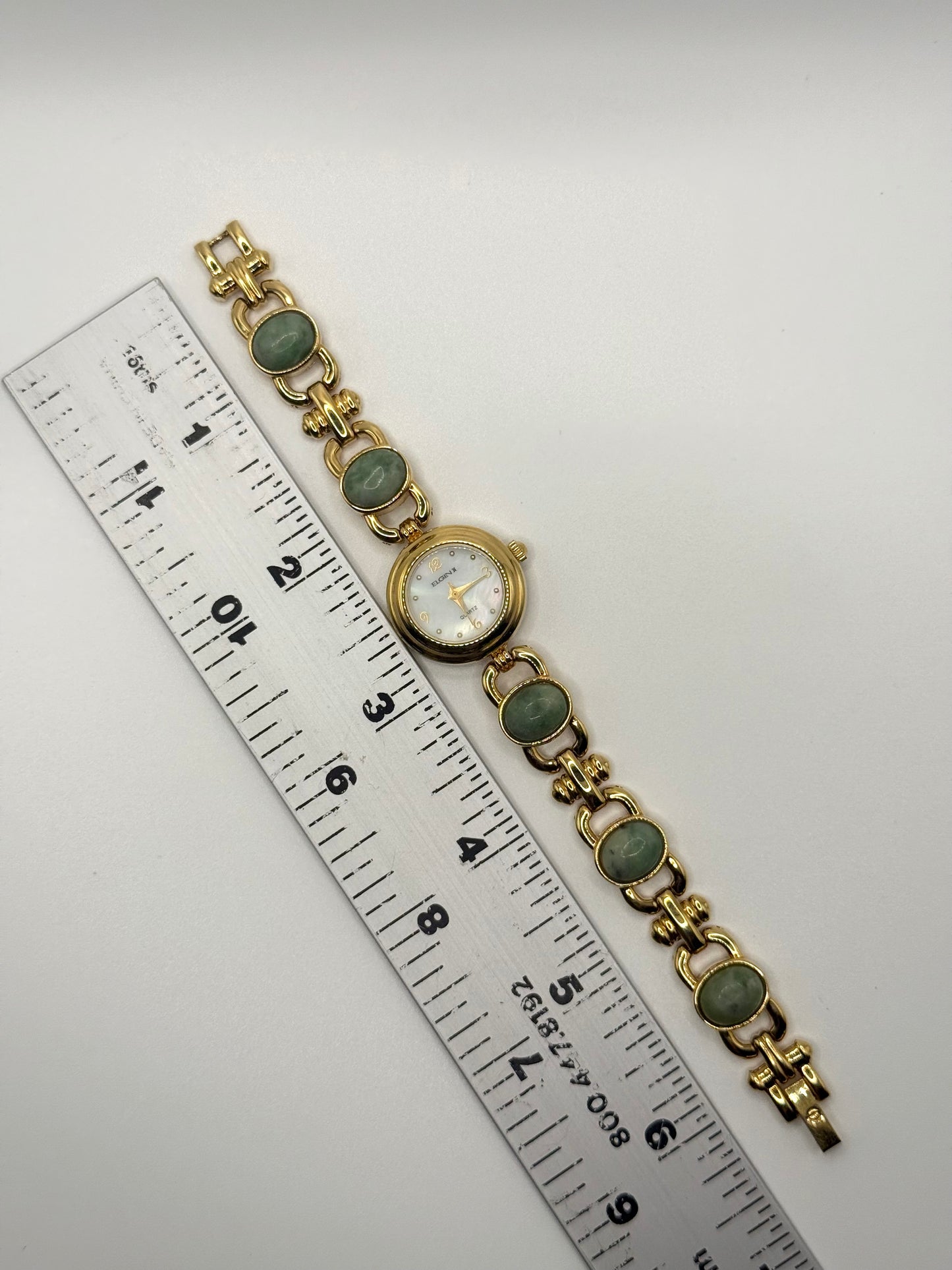 working gold tone green jade gemstone watch