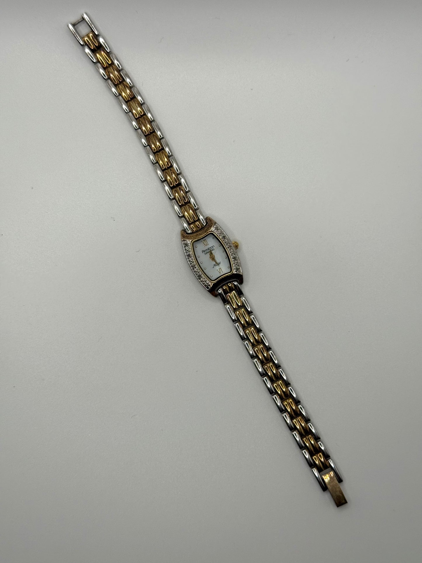working two tone diamond bezel watch