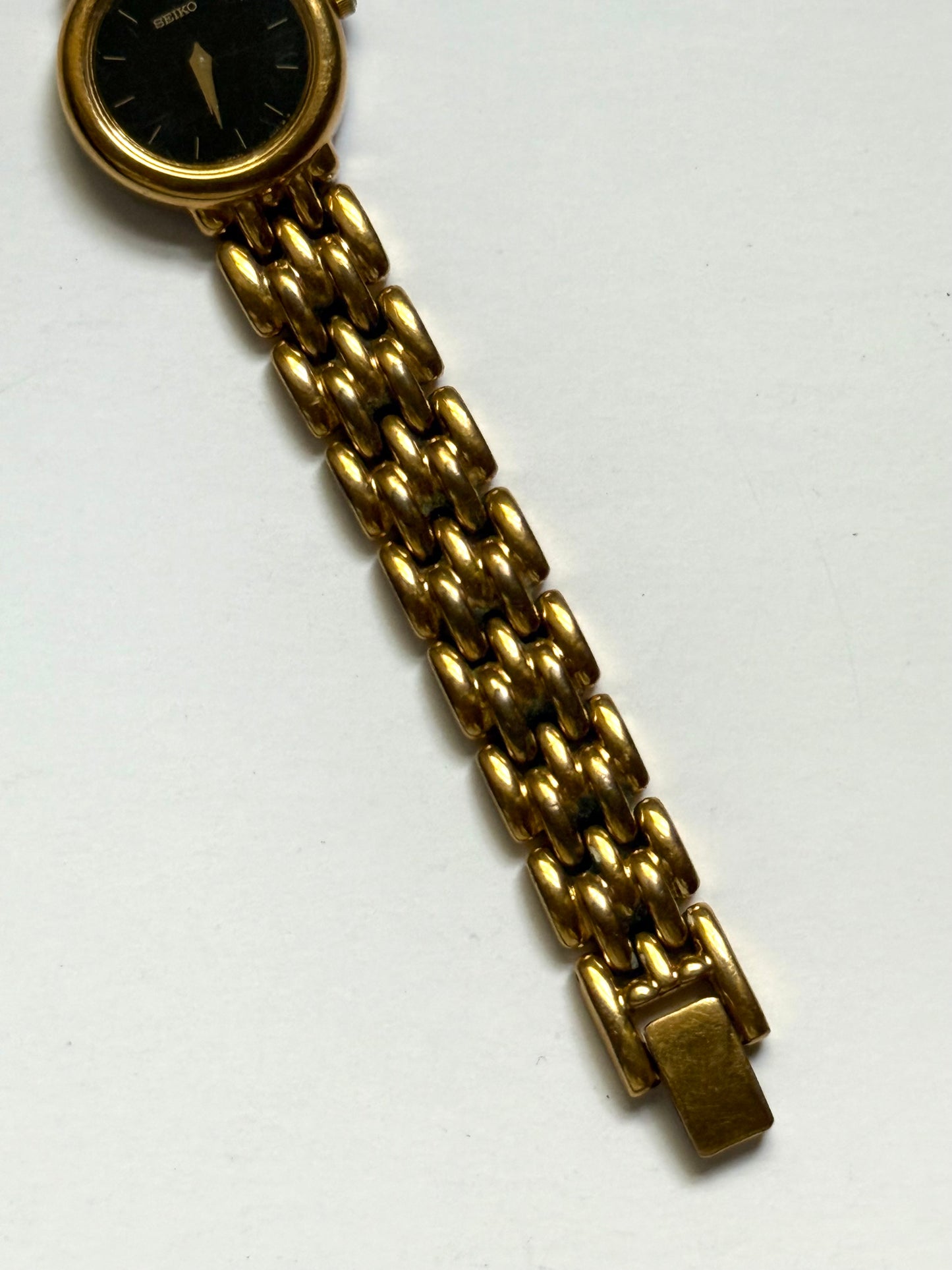working gold tone black dial seiko watch
