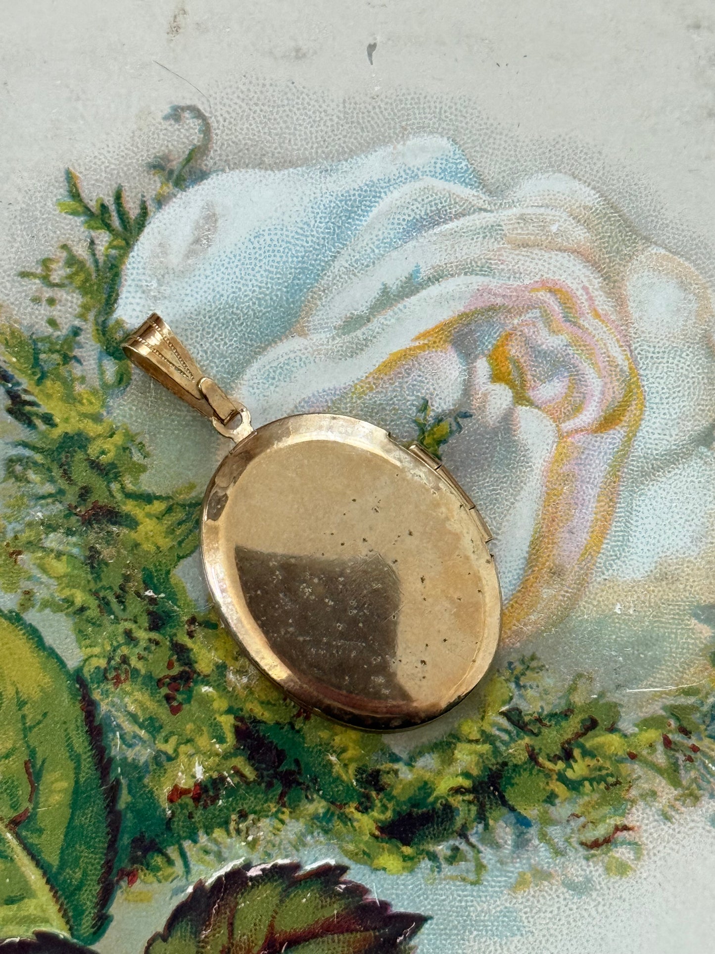 gold tone locket pendant
