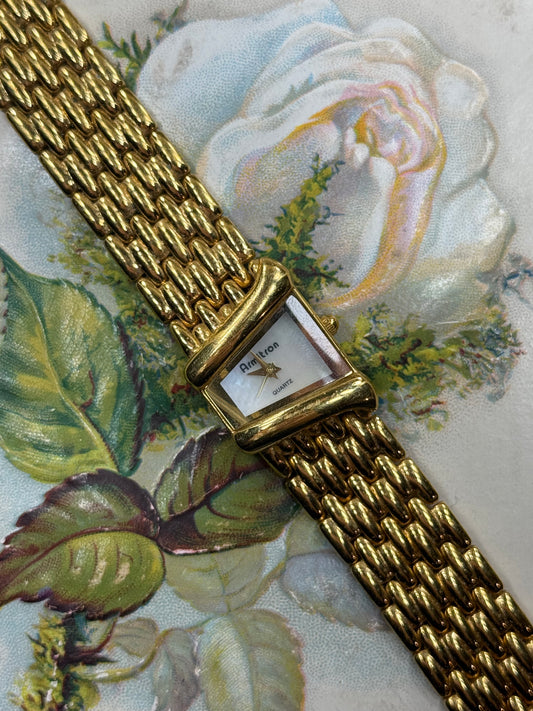 working gold tone vintage half moon watch
