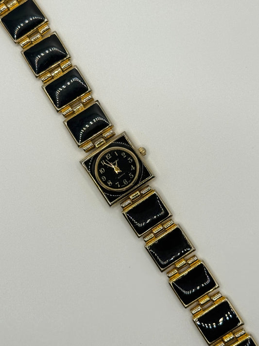 nonworking gold tone black enamel watch