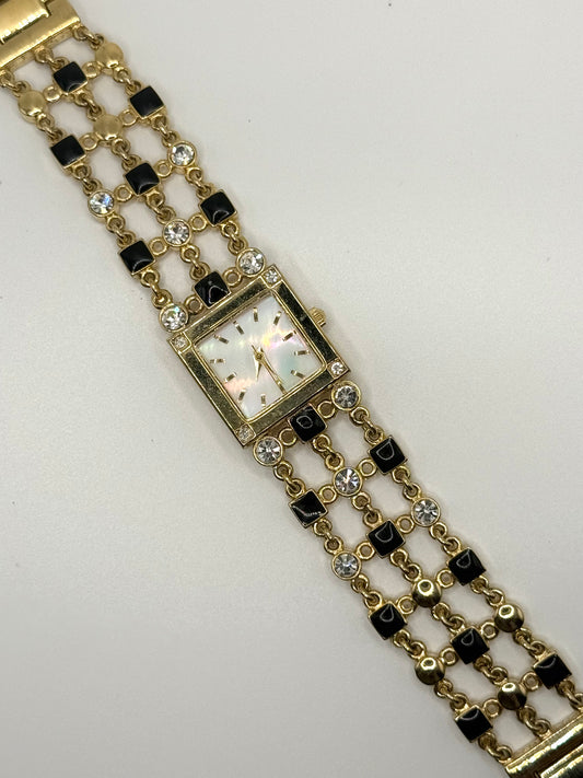 working gold tone black enamel and rhinestone watch
