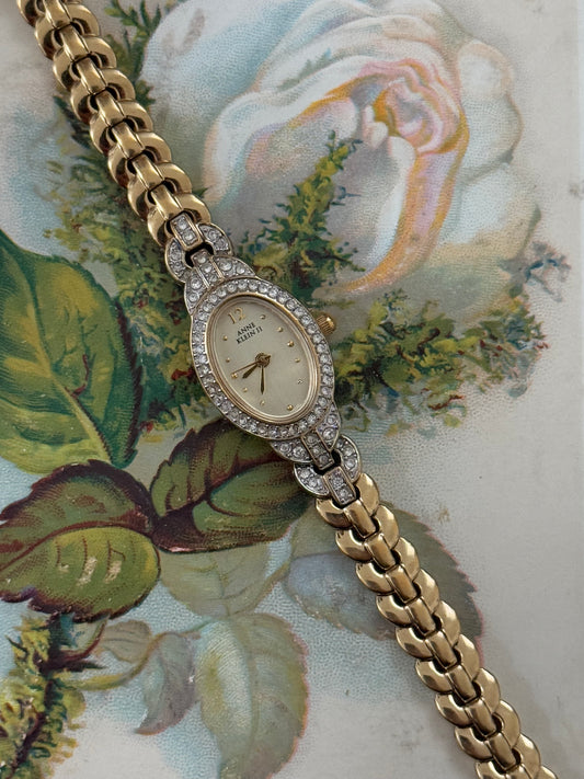 anne klein gold tone vintage crystal bezel watch