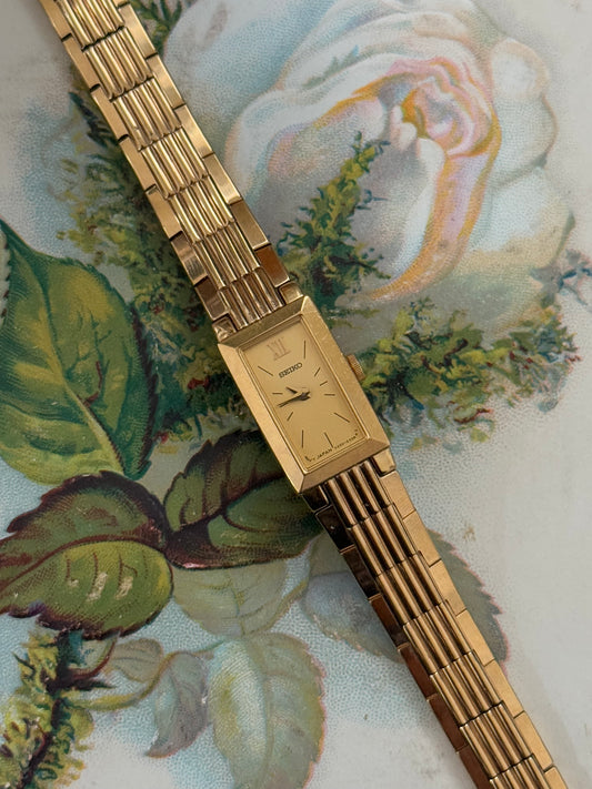 seiko gold tone vintage rectangle dial watch