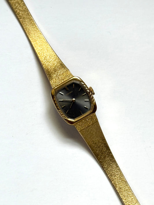 working gold tone wind up gray dial seiko watch
