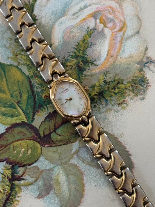 citizen dainty gold tone mother of pearl dial watch