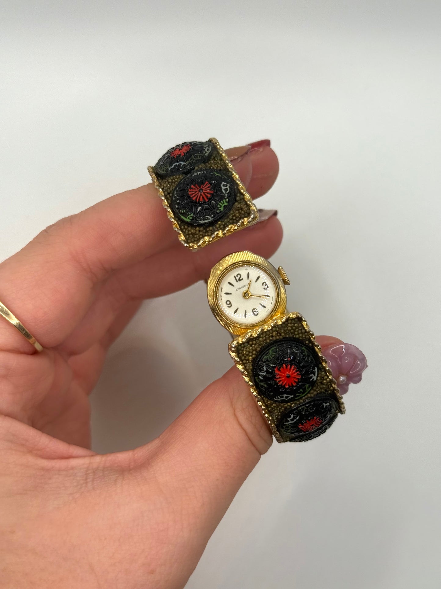 working gold tone wind up caravelle by bulova peek a boo watch