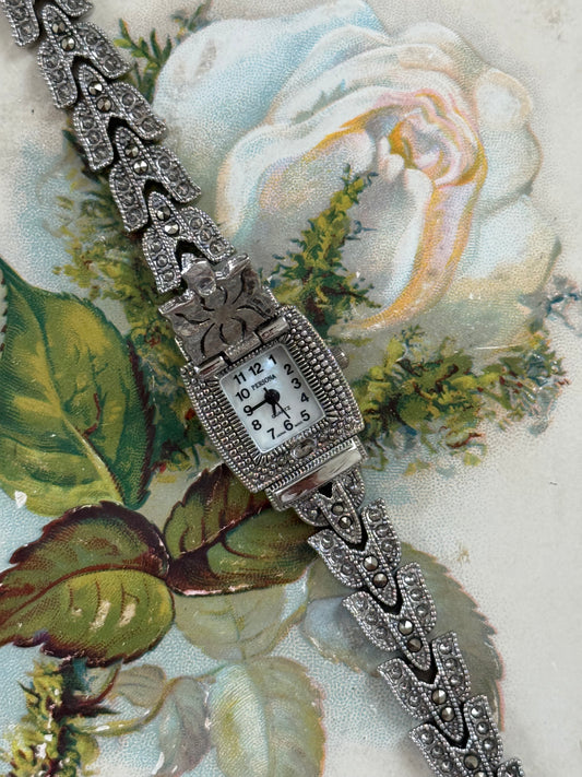 working silver tone marcasite peek a boo watch
