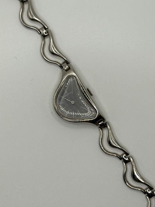 working silver tone wind up half moon watch