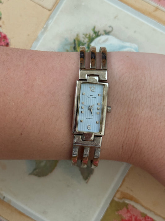 working silver tone tank watch