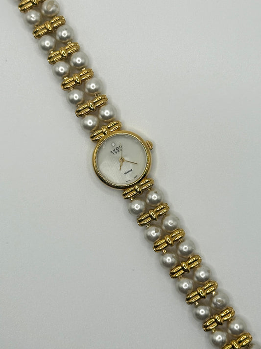 nonworking gold tone pearl band watch