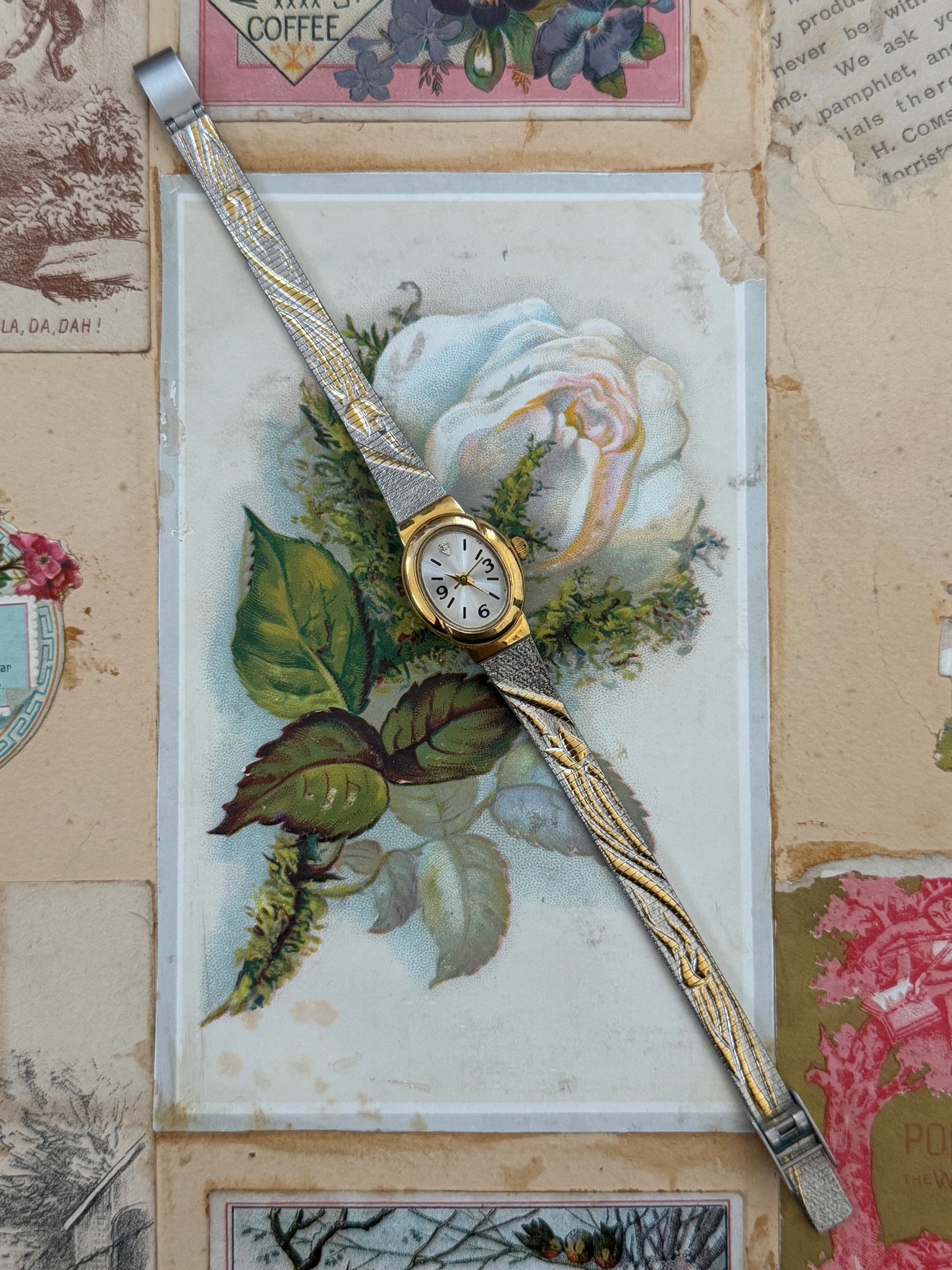 avon two tone flower decal vintage watch