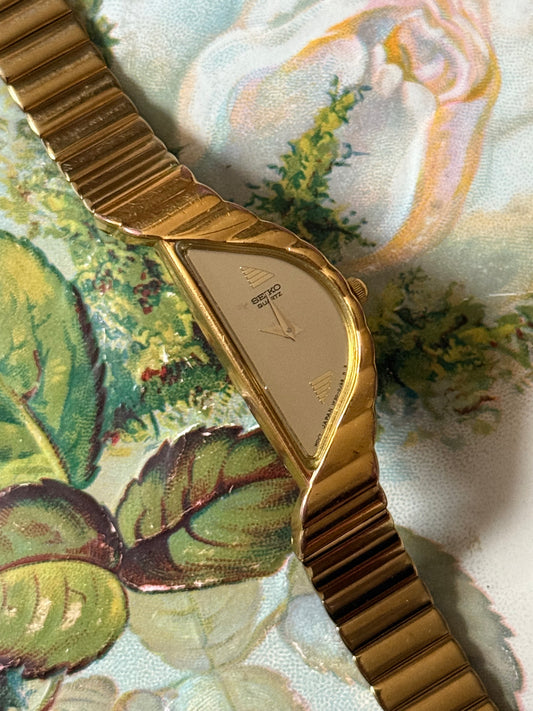 nonworking seiko half moon gold tone watch