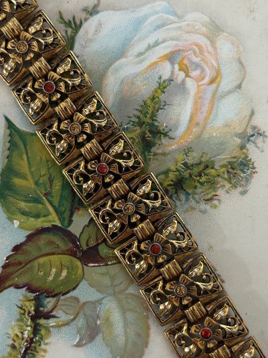 gold tone colored rhinestone panel bracelet