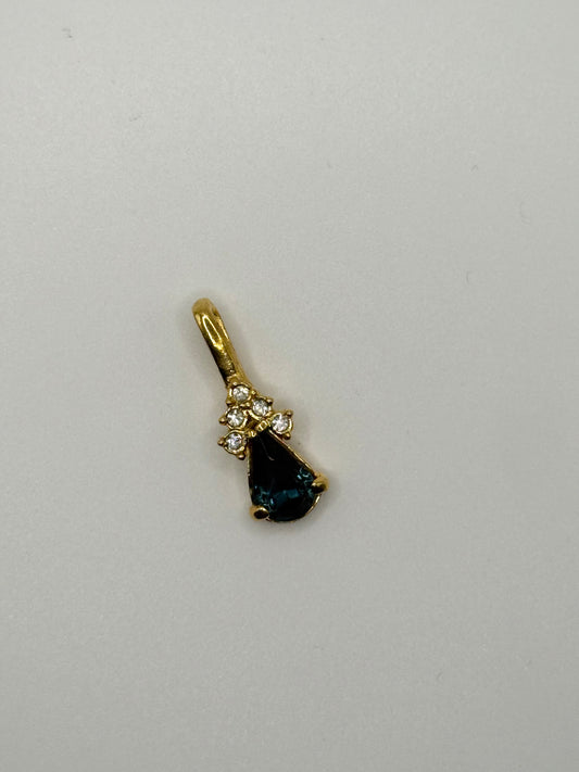 gold tone blue gemstone style pendant