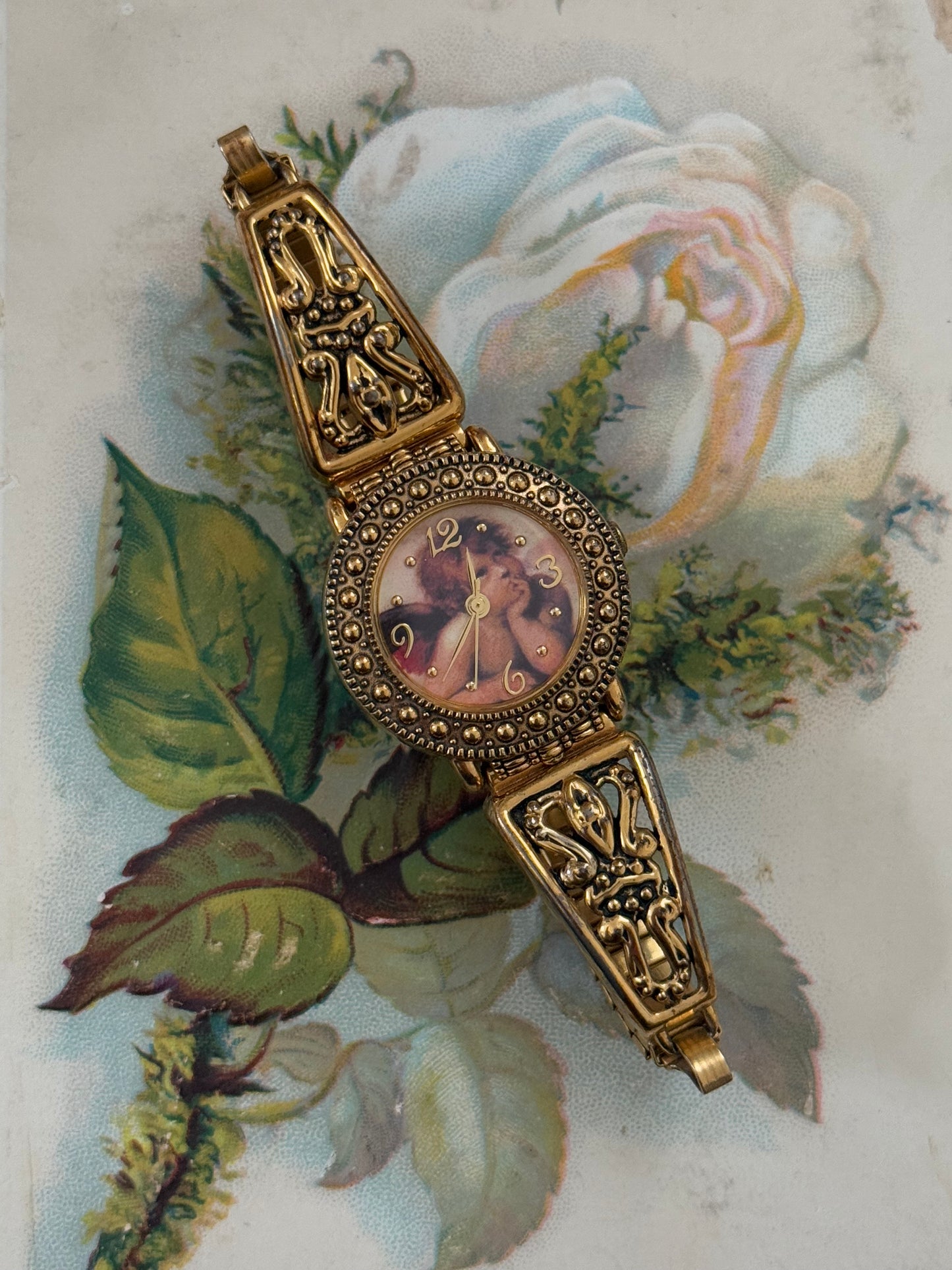 avon gold tone vintage cherub watch