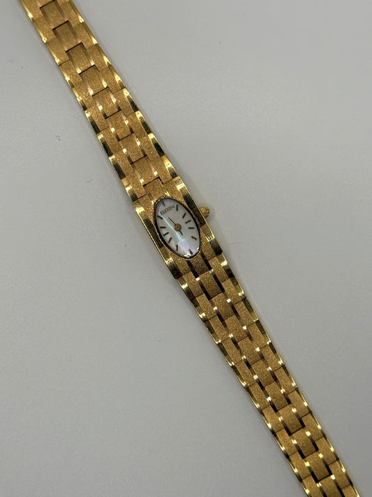 working gold tone oval dial watch