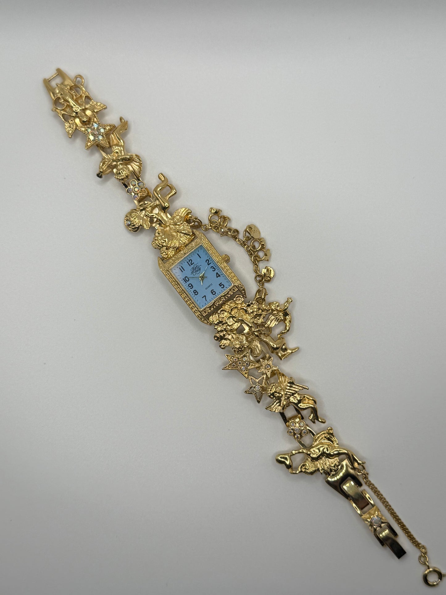 working gold tone kirks folly secret of the seven angels watch