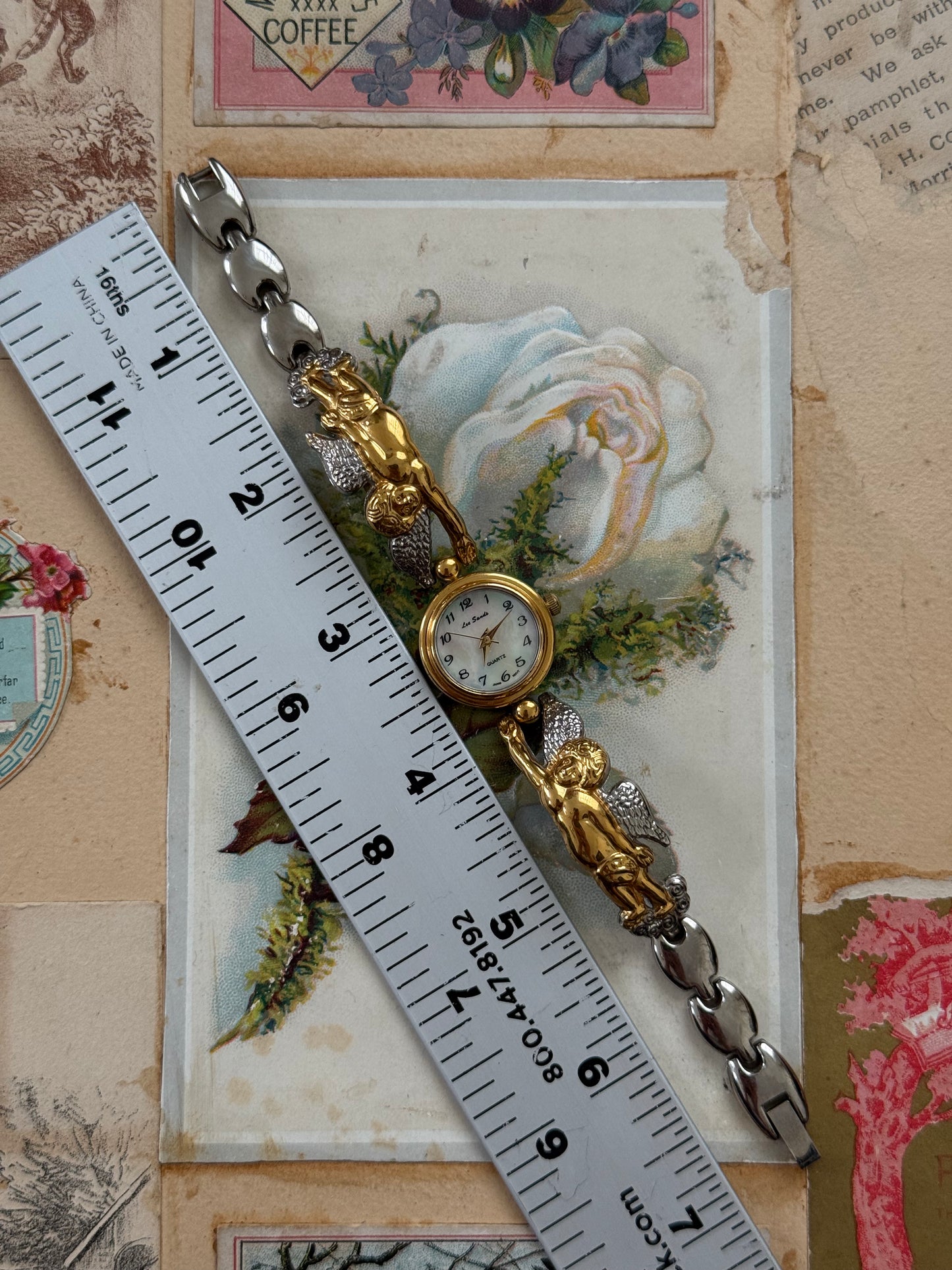 working two tone cherub watch