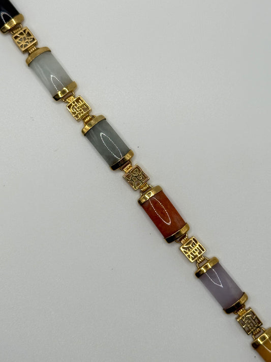 gold tone colored jade bracelet